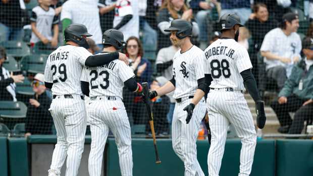 May 24, 2025; Chicago, Illinois, USA; Chicago White Sox players celebrate after scoring against the Texas Rangers during the sixth inning at Rate Field.