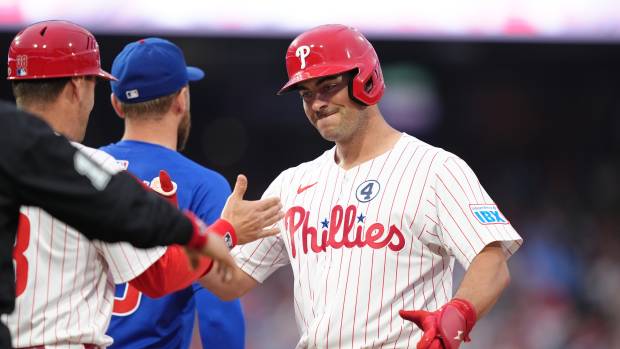 Jun 9, 2025; Philadelphia, Pennsylvania, USA; Philadelphia Phillies infielder Otto Kemp (4) reacts after hitting a single agianst the Chicago Cubs in the fifth inning at Citizens Bank Park.