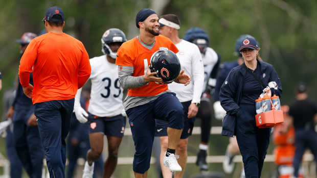 Jun 3, 2025; Lake Forest, IL, USA; Chicago Bears quarterback Caleb Williams (18) warms up during minicamp at Halas Hall.