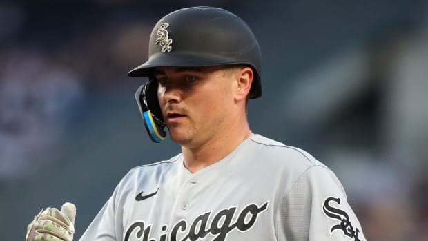 May 22, 2022; Bronx, New York, USA; Chicago White Sox catcher Reese McGuire (21) reaches first base after hitting a single in the third inning against the New York Yankees at Yankee Stadium.