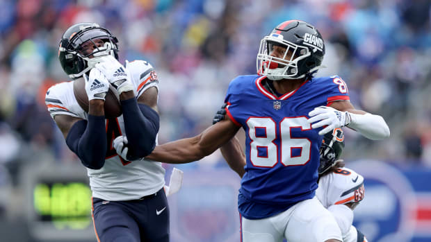 Oct 2, 2022; East Rutherford, New Jersey, USA; Chicago Bears safety Eddie Jackson (4) intercepts a pass intended for New York Giants wide receiver Darius Slayton (86) during the fourth quarter at MetLife Stadium.