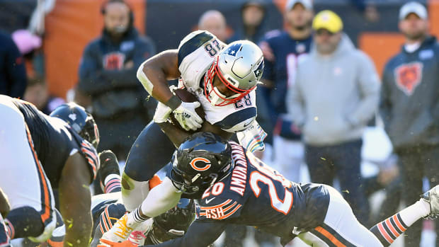 Oct 21, 2018; Chicago, IL, USA; New England Patriots running back James White (28) is tackled by Chicago Bears cornerback Prince Amukamara (20) at Soldier Field. Mandatory Credit: Quinn Harris-USA TODAY Sports