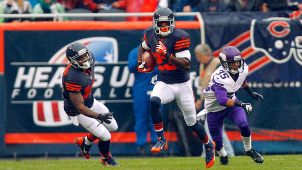 Sep 15, 2013; Chicago, IL, USA; Chicago Bears wide receiver Devin Hester (23) returns a kick during the first quarter against the Minnesota Vikings at Soldier Field. Mandatory Credit: Dennis Wierzbicki-USA TODAY Sports