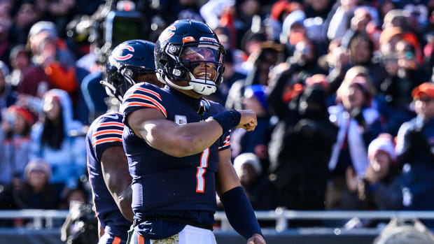 Nov 13, 2022; Chicago, Illinois, USA; Chicago Bears quarterback Justin Fields (1) celebrates his rushing touchdown in the second quarter against the Detroit Lions at Soldier Field. Mandatory Credit: Daniel Bartel-USA TODAY Sports