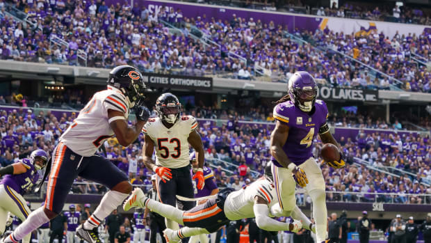 Dalvin Cook of the Minnesota Vikings runs with the ball during the