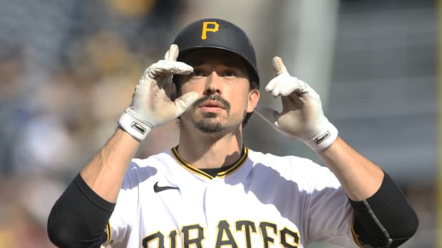 Sep 25, 2022; Pittsburgh, Pennsylvania, USA; Pittsburgh Pirates center fielder Bryan Reynolds (10) reacts crossing home plate on a solo home run the Chicago Cubs during the sixth inning at PNC Park.