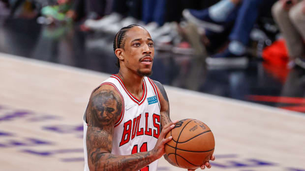 Apr 22, 2022; Chicago, Illinois, USA; Chicago Bulls forward DeMar DeRozan (11) shoots a free throw against the Milwaukee Bucks during the first half of game three of the first round for the 2022 NBA playoffs at United Center. Mandatory Credit: Kamil Krzaczynski-USA TODAY Sports