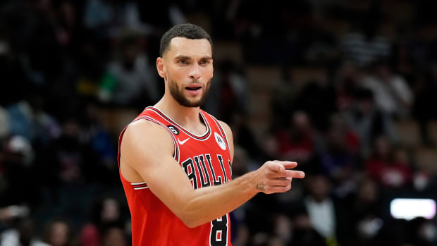 Oct 9, 2022; Toronto, Ontario, CAN; Chicago Bulls guard Zach LaVine (8) points during the second half against the Toronto Raptors at Scotiabank Arena.