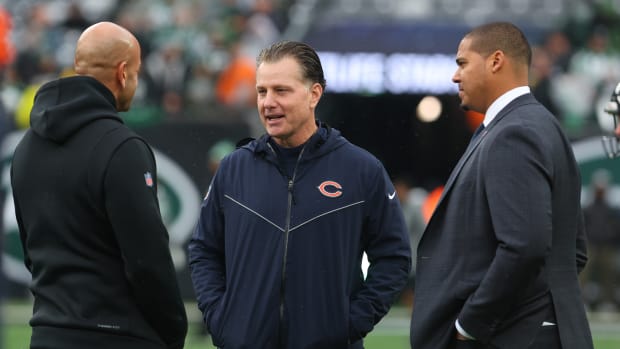 Nov 27, 2022; East Rutherford, New Jersey, USA; New York Jets head coach Robert Saleh (left) speaks with Chicago Bears head coach Matt Eberflus (center) and general manager Ryan Poles during pregame warmups at MetLife Stadium. Mandatory Credit: Ed Mulholland-USA TODAY Sports