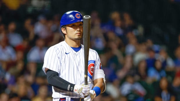 Aug 23, 2022; Chicago, Illinois, USA; Chicago Cubs right fielder Seiya Suzuki (27) bats against the St. Louis Cardinals during the eight inning of the second game of the doubleheader at Wrigley Field.