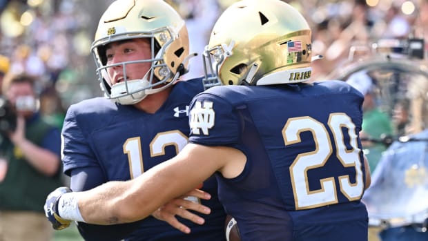 Sep 10, 2022; South Bend, Indiana, USA; Notre Dame Fighting Irish quarterback Tyler Buchner (12) celebrates with wide receiver Matt Salerno (29) after running for a two point conversation in the fourth quarter against the Marshall Thundering Herd at Notre Dame Stadium.