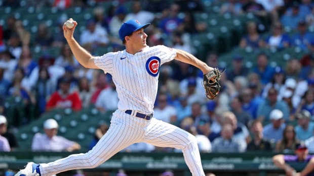 Sep 17, 2022; Chicago, Illinois, USA; Chicago Cubs starting pitcher Hayden Wesneski (19) pitches against the Colorado Rockies during the first inning at Wrigley Field.