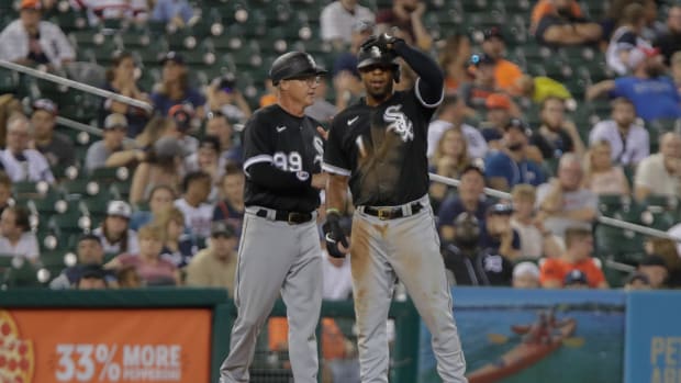 Sep 17, 2022; Detroit, Michigan, USA; Chicago White Sox third base coach Joe McEwing talks with shortstop Elvis Andrus (1) during a game against the Detroit Tigers at Comerica Park.