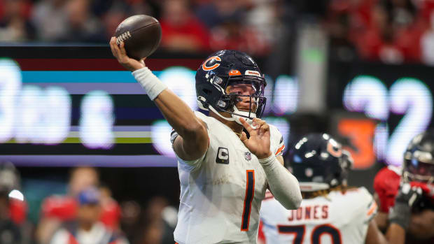 Nov 20, 2022; Atlanta, Georgia, USA; Chicago Bears quarterback Justin Fields (1) throws a pass against the Atlanta Falcons in the second half at Mercedes-Benz Stadium.