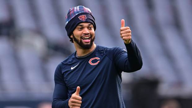 Nov 17, 2024; Chicago, Illinois, USA; Chicago Bears quarterback Caleb Williams (18) warms up before the game against the Green Bay Packers at Soldier Field.