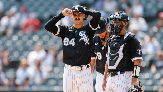 Sep 14, 2022; Chicago, Illinois, USA; Chicago White Sox starting pitcher Dylan Cease (84) reacts after giving up a RBI-double in the second inning against the Colorado Rockies at Guaranteed Rate Field.
