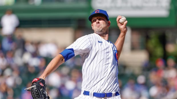 Oct 1, 2022; Chicago, Illinois, USA; Chicago Cubs starting pitcher Drew Smyly (11) delivers against the Cincinnati Reds during the first inning at Wrigley Field.