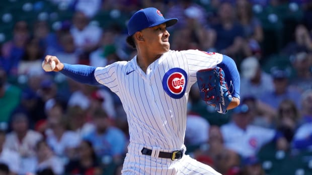 Sep 26, 2021; Chicago, Illinois, USA; Chicago Cubs relief pitcher Adbert Alzolay (73) throws the ball against the St. Louis Cardinals during the fourth inning at Wrigley Field.