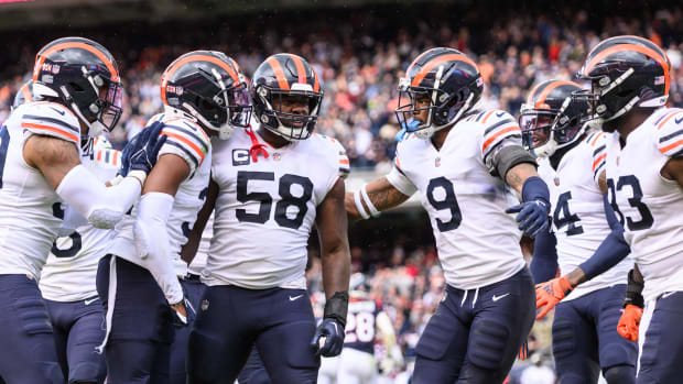 Sep 25, 2022; Chicago, Illinois, USA; Chicago Bears inside linebacker Roquan Smith (58) celebrates with teammates after an interception in the fourth quarter against the Houston Texans at Soldier Field.