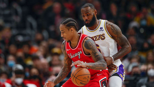 Dec 19, 2021; Chicago, Illinois, USA; Los Angeles Lakers forward LeBron James (6) defends against Chicago Bulls forward DeMar DeRozan (11) during the second half at United Center.