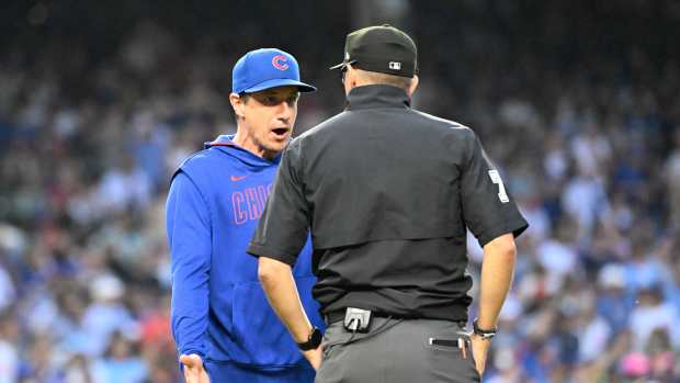 Jul 6, 2025; Chicago, Illinois, USA; Chicago Cubs manager Craig Counsell (11) argues a call with umpire Adam Hamari (78) during the third inning against the St. Louis Cardinals at Wrigley Field.