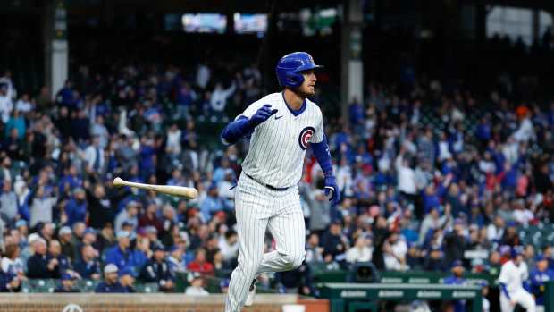 Apr 23, 2024; Chicago, Illinois, USA; Chicago Cubs outfielder Cody Bellinger (24) watches his two-run home run against the Houston Astros during the first inning at Wrigley Field.