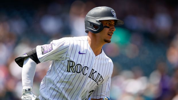 Jul 21, 2021; Denver, Colorado, USA; Colorado Rockies catcher Dom Nunez (3) runs to second base on a three-RBI double in the first inning against the Seattle Mariners at Coors Field.