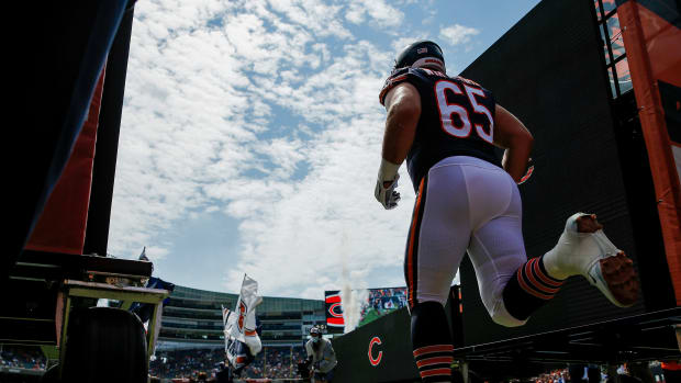 Aug 21, 2021; Chicago, Illinois, USA; Chicago Bears center Cody Whitehair (65) runs onto the field before the game against the Buffalo Bills at Soldier Field. The Buffalo Bills won 41-15.