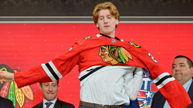 Jul 7, 2022; Montreal, Quebec, CANADA; Sam Rinzel after being selected as the number twenty-five overall pick to the Chicago Blackhawks in the first round of the 2022 NHL Draft at Bell Centre.