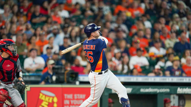 Sep 11, 2022; Houston, Texas, USA; Houston Astros designated hitter Trey Mancini (26) watches his grand slam home run in the fifth inning at Minute Maid Park.
