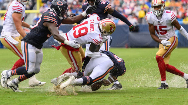 Sep 11, 2022; Chicago, Illinois, USA; San Francisco 49ers wide receiver Deebo Samuel (19) fumbles the ball which is recovered by Chicago Bears safety Jaquan Brisker (9) in the first quarter at Soldier Field. Mandatory Credit: Daniel Bartel-USA TODAY Sports