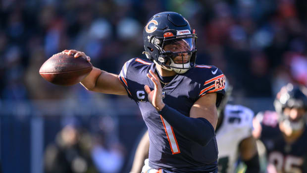Dec 18, 2022; Chicago, Illinois, USA; Chicago Bears quarterback Justin Fields (1) passes the ball in the first quarter against the Philadelphia Eagles at Soldier Field.