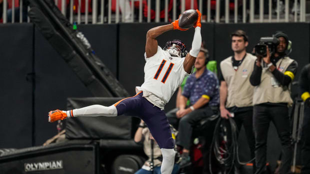 Nov 20, 2022; Atlanta, Georgia, USA; Chicago Bears wide receiver Darnell Mooney (11) catches a touchdown pass against the Atlanta Falcons during the first quarter at Mercedes-Benz Stadium.