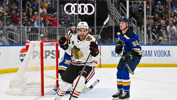 Apr 10, 2024; St. Louis, Missouri, USA; Chicago Blackhawks left wing Landon Slaggert (84) reacts after scoring his first career NHL goal during the third period against the St. Louis Blues at Enterprise Center.