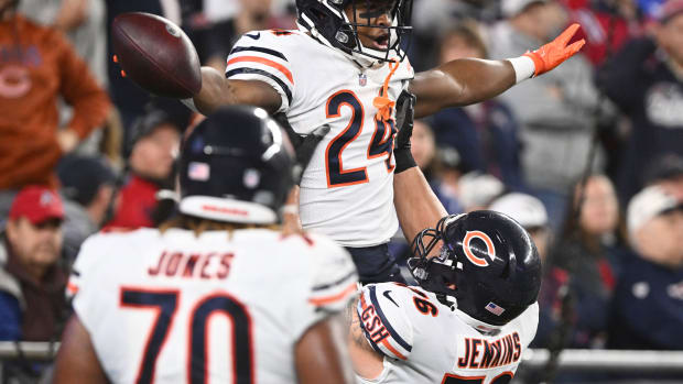 Oct 24, 2022; Foxborough, Massachusetts, USA; Chicago Bears running back Khalil Herbert (24) celebrates with offensive tackle Teven Jenkins (76) after scoring a touchdown against the New England Patriots during the first half at Gillette Stadium. Mandatory Credit: Brian Fluharty-USA TODAY Sports