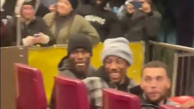 DeMar DeRozan, Zach LaVine, and Chicago Bulls teammates sit in a ride at Six Flags