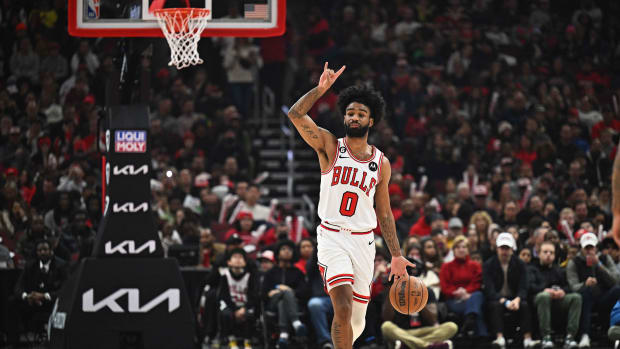 Jan 7, 2023; Chicago, Illinois, USA; Chicago Bulls guard Coby White (0) controls the ball against the Utah Jazz at United Center.