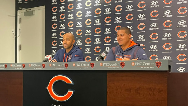 Bears assistant GM Ian Cunningham (left) and GM Ryan Poles (right) at Halas Hall before the 2022-23 season began.