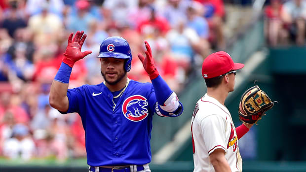Jun 25, 2022; St. Louis, Missouri, USA; Chicago Cubs catcher Willson Contreras (40) reacts after hitting a double against the St. Louis Cardinals during the first inning at Busch Stadium.