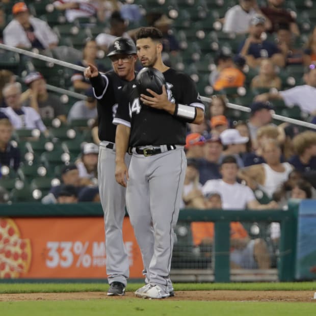 Sep 17, 2022; Detroit, Michigan, USA; Chicago White Sox third base coach Joe McEwing talks with catcher Seby Zavala (44) during a game against the Detroit Tigers at Comerica Park.