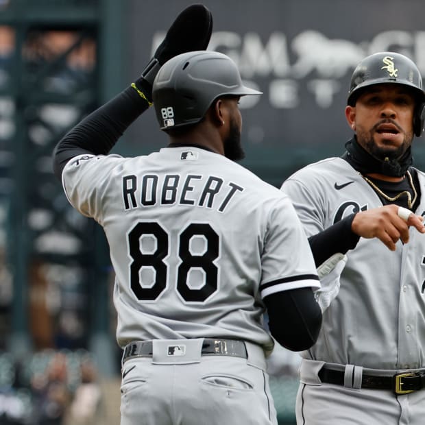 Apr 9, 2022; Detroit, Michigan, USA; Chicago White Sox center fielder Luis Robert (88) and first baseman Jose Abreu (79) congratulate each other after scoring in the first inning against the Detroit Tigers at Comerica Park.