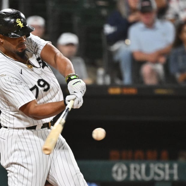 Aug 27, 2022; Chicago, Illinois, USA; Chicago White Sox infielder Jose Abreu (79) hits an RBI single in the eighth inning against the Arizona Diamondbacks at Guaranteed Rate Field.