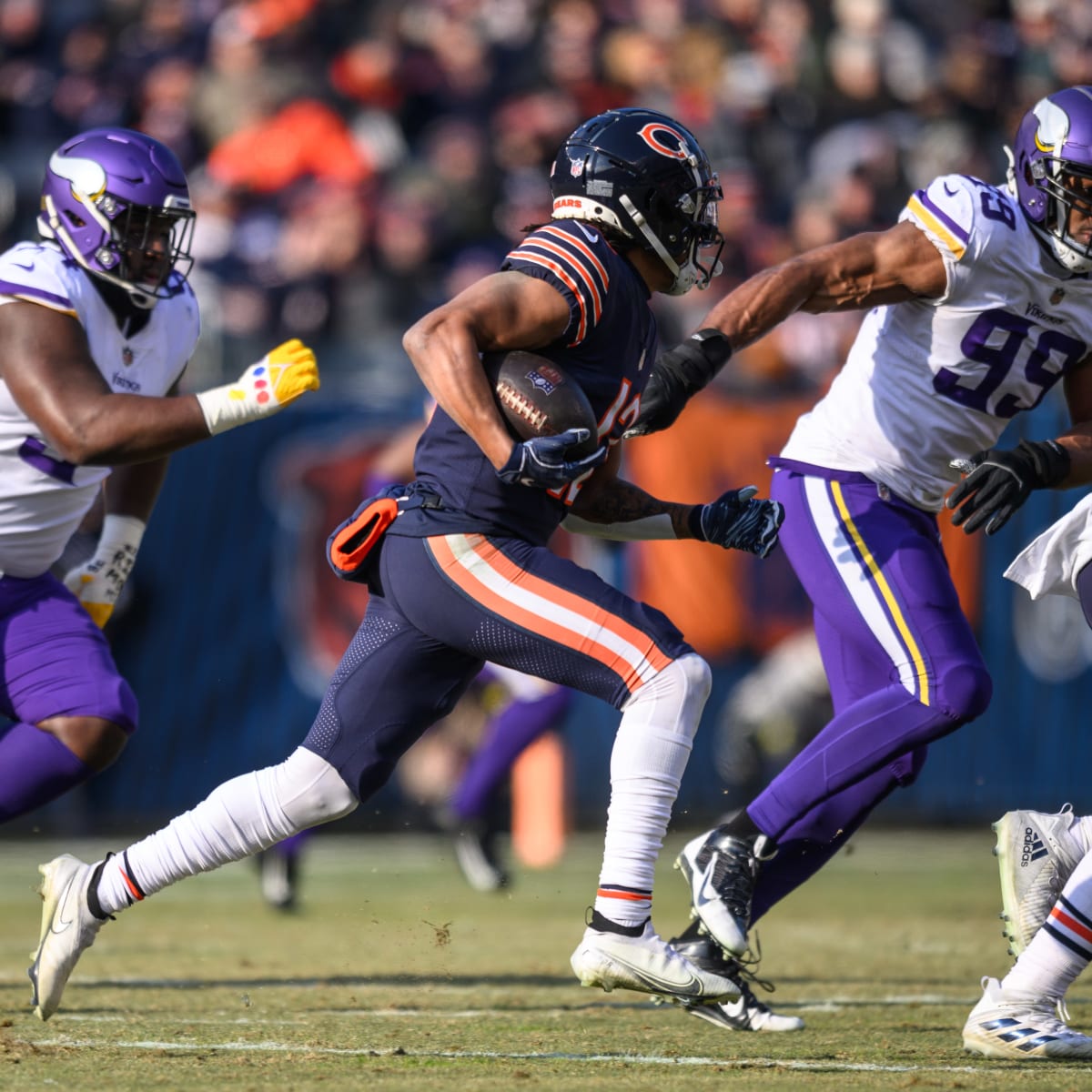 Chicago Bears running back Thomas Jones is taken down by a slue of  Minnesota Vikings during the first quarter, at Soldier Field in Chicago on  Oct. 16, 2005. (UPI Photo/Brian Kersey Stock