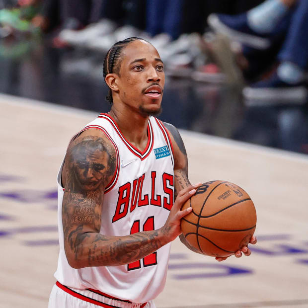 Apr 22, 2022; Chicago, Illinois, USA; Chicago Bulls forward DeMar DeRozan (11) shoots a free throw against the Milwaukee Bucks during the first half of game three of the first round for the 2022 NBA playoffs at United Center. Mandatory Credit: Kamil Krzaczynski-USA TODAY Sports