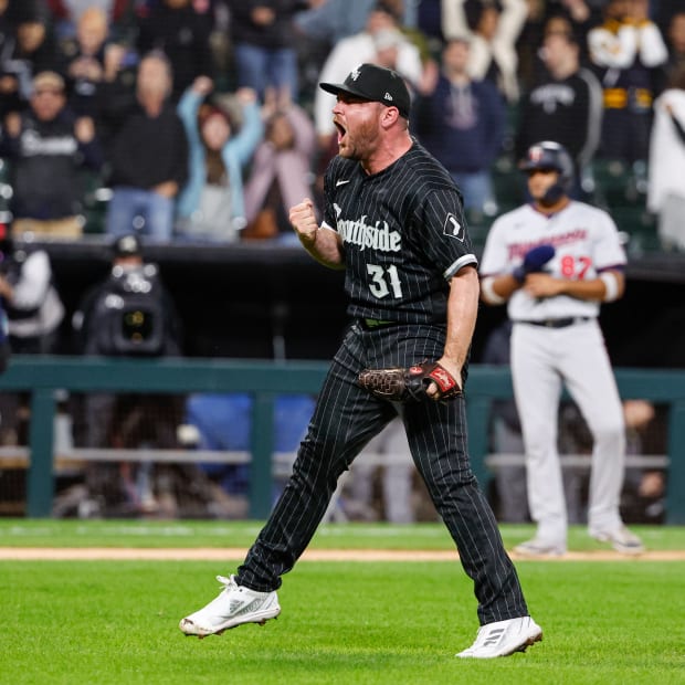 Oct 3, 2022; Chicago, Illinois, USA; Chicago White Sox relief pitcher Liam Hendriks (31) celebrates team's 3-2 win against the Minnesota Twins at Guaranteed Rate Field.