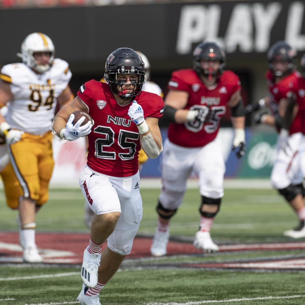 Atlanta Falcons running back Clint Ratkovich runs with the football News  Photo - Getty Images