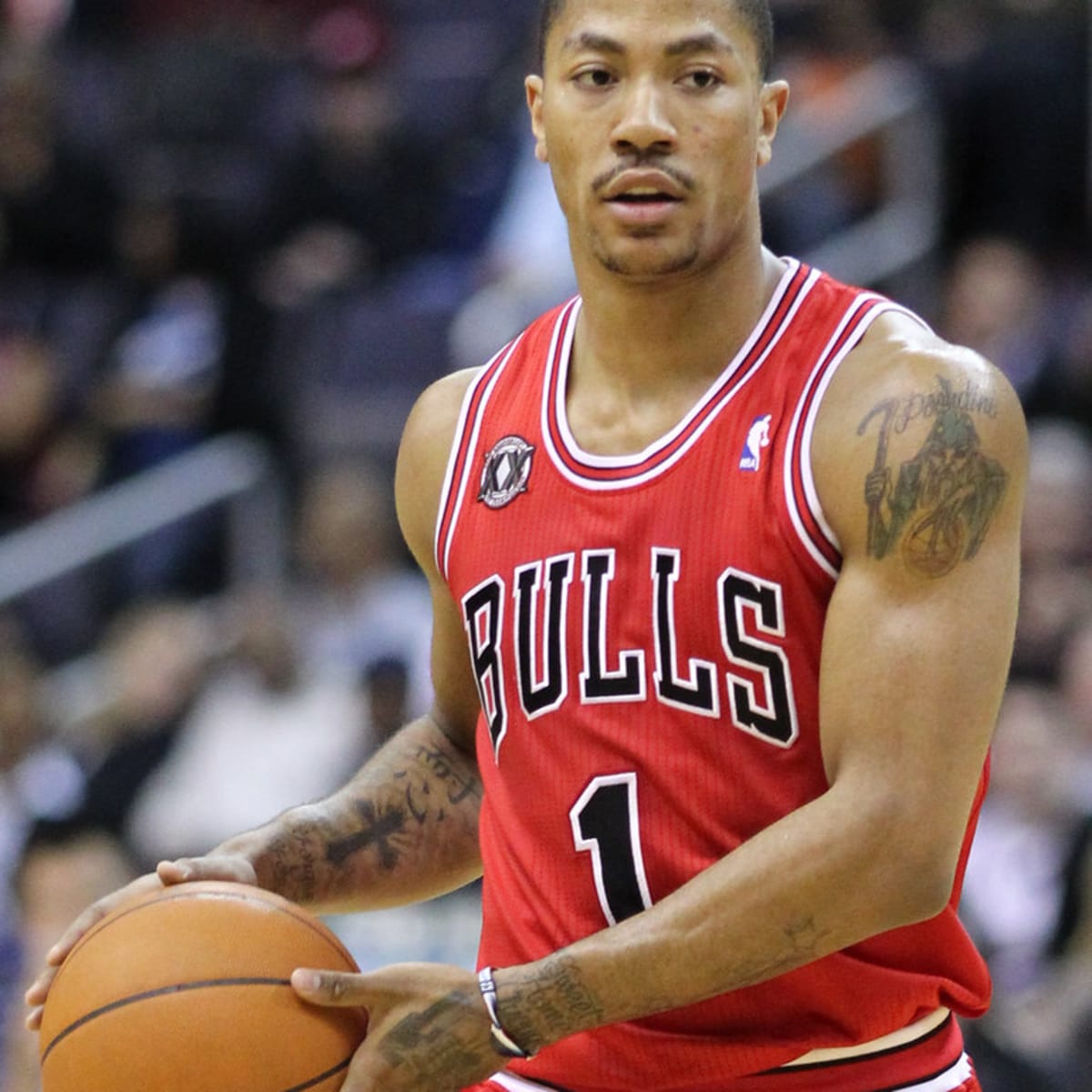 Chicago Bulls draft pick Derrick Rose holds up his Bulls jersey at a press  conference at the United Center on Monday, June 30, 2008, in Chicago,  Illinois. (Photo by Charles Cherney/Chicago Tribune/MCT/Sipa