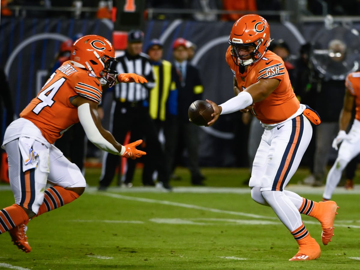 December 24, 2022 - Chicago Bears running back Khalil Herbert (24) takes  off with the ball during NFL football game versus the Buffalo Bills in  Chicago, IL Stock Photo - Alamy