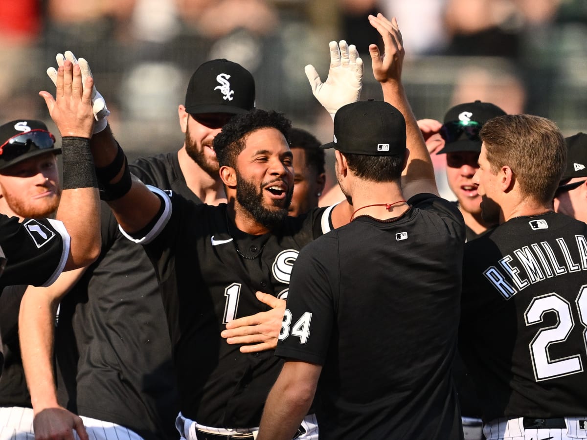 Elvis Andrus of the Chicago White Sox celebrates with third base