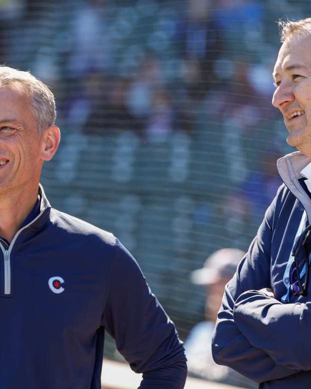 Oct 1, 2022; Chicago, Illinois, USA; Chicago Cubs President of baseball operations Jed Hoyer (L) smiles next to Chicago Cubs Chairman Tom Ricketts (R) before a baseball game between the Chicago Cubs and Cincinnati Reds at Wrigley Field.